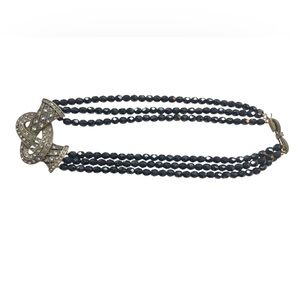 Heidi Daus lovers knot necklace